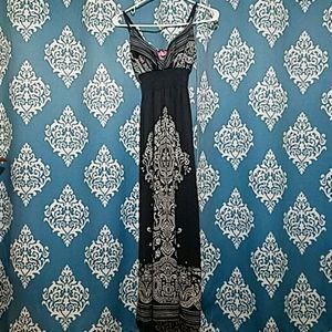 Long black machine washable 95% polyester dress.